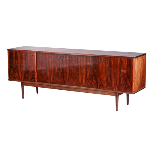 258 - A rosewood sideboard, late 1960s, designed by Johannes Anderson for Christian Linneberg, with slidin... 