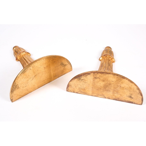 259 - A pair of giltwood wall brackets of classical style, of volute fanned form with demi-lune plinths ab... 