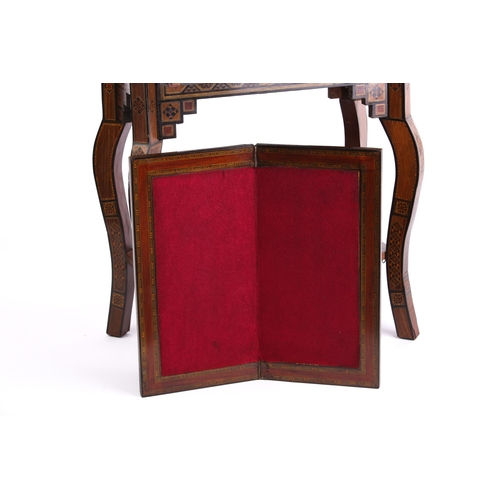 267 - A Damascus parquetry inlaid fold over gaming table,1920s. The rectangular top opens and rotates to r... 