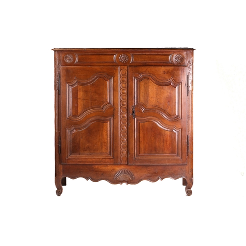 270 - A French walnut and fruitwood buffet cupboard, late 18th century/ early 19th-century, with a pair of... 