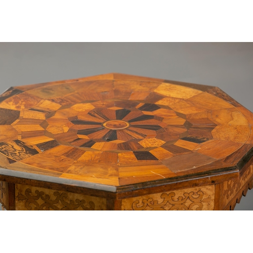 272 - In the manner of Ralph Turnbull, an early Victorian specimen timber inlaid worktable, the octagonal ... 