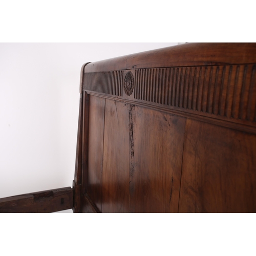 278 - A French Napoleon III walnut and fruitwood double bedstead with scroll ends and carved arcading, ros... 