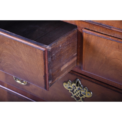 287 - A 19th century walnut chest with brass furniture, two short over three graduated drawers, on bracket... 