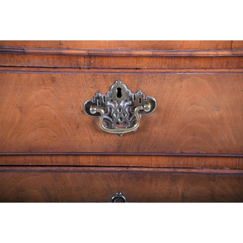 287 - A 19th century walnut chest with brass furniture, two short over three graduated drawers, on bracket... 