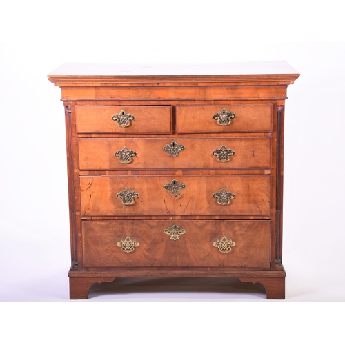 287 - A 19th century walnut chest with brass furniture, two short over three graduated drawers, on bracket... 