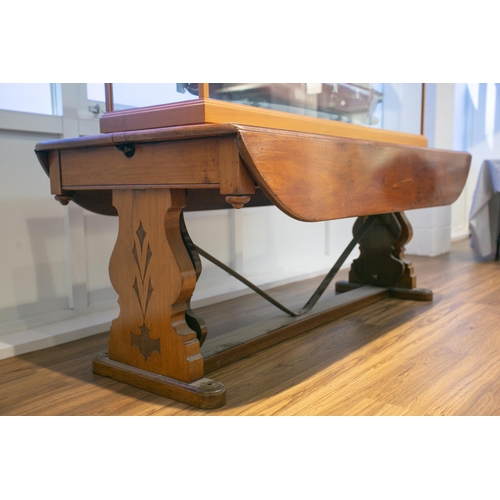 288 - An unusual early 20th-century mahogany ships two flap wardroom table with compensating tilting mecha... 