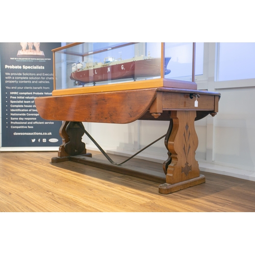 288 - An unusual early 20th-century mahogany ships two flap wardroom table with compensating tilting mecha... 