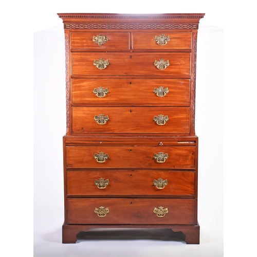 292 - A George III mahogany chest on chest, with carved frieze and brass furniture, two short over six lon... 