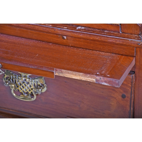 292 - A George III mahogany chest on chest, with carved frieze and brass furniture, two short over six lon... 