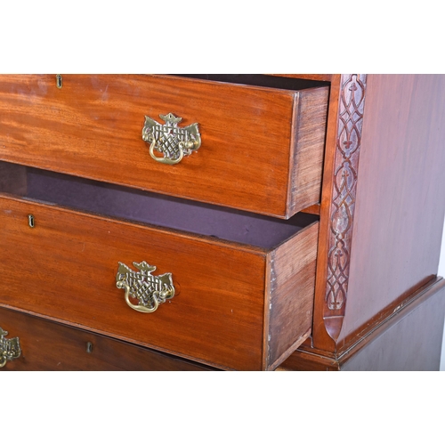 292 - A George III mahogany chest on chest, with carved frieze and brass furniture, two short over six lon... 