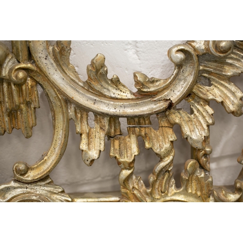 312 - A pair of 'Chinese Chippendale' style carved, pierced wood and gilt gesso wall mirrors, 20th century... 