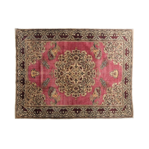 315 - A fine late 19th century /early 20th-century plum red ground silk Isfahan rug, with central barbed m... 