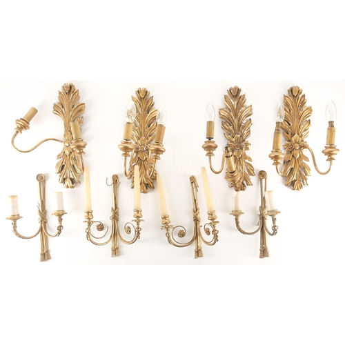 323 - A pair of Louis XVI style gilt brass wall sconces, 20th century, of tied cord form with faux hanging... 