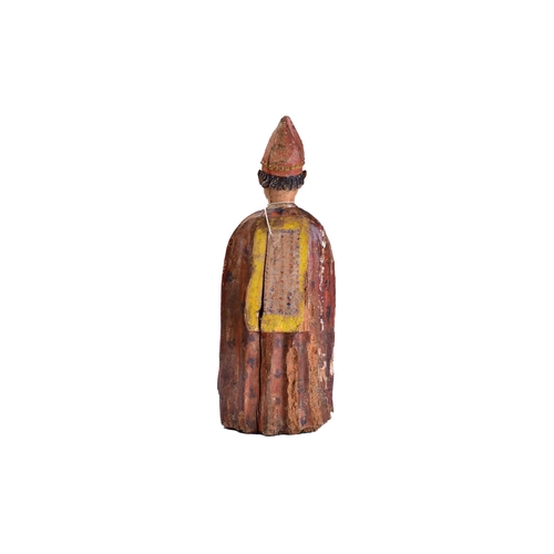 337 - A Spanish carved wood and polychromic painted figure of a Bishop, probably late 16th century, clothe... 