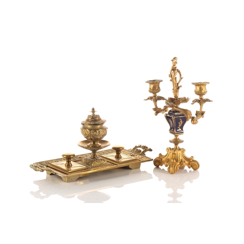 347 - A pair of French ormolu four sconce candelabra,19th century. In the form of trumpet Lillies issued f... 