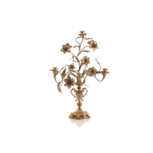 347 - A pair of French ormolu four sconce candelabra,19th century. In the form of trumpet Lillies issued f... 