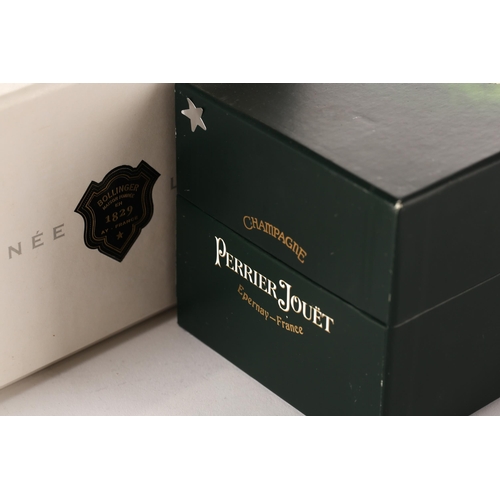 428 - A cased bottle of 1999 Bollinger Champagne, together with a boxed bottle of Perrier Jouet Belle Epoq... 