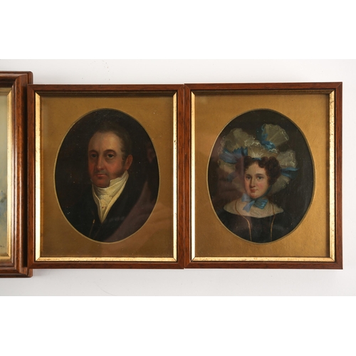 467 - A pair of small 19th century framed portraits, depicting a smartly dressed gentleman and lady, oil o... 