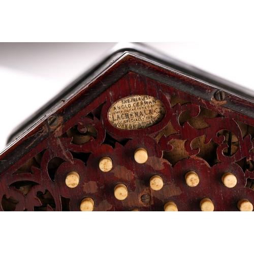 477 - A Lachenal & Co. twenty-seven bone-button concertina, with pierced fretworked rosewood ends, leather... 