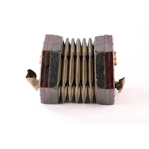 477 - A Lachenal & Co. twenty-seven bone-button concertina, with pierced fretworked rosewood ends, leather... 