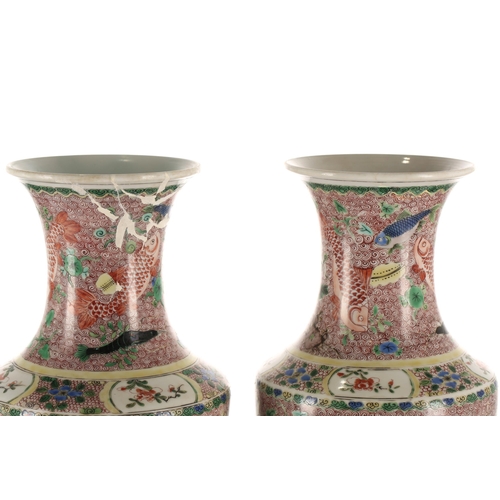 89 - A pair of Chinese famille verte vases, Qing, of cylindrical form, painted with various fish, crabs a... 