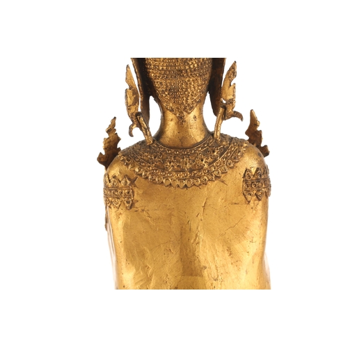 99 - A Thai gilt bronze figure of Buddha, 19th/20th century, standing in double Abhaya Mudra, with inset ... 