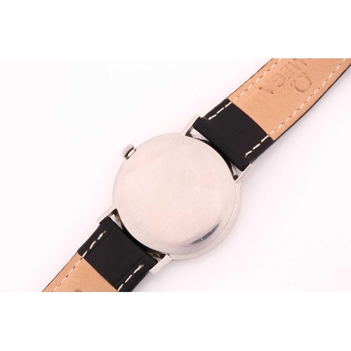 505 - A hand-wound Omega with a steel case measuring 34mm and silver colour dial with a date aperture at 3... 