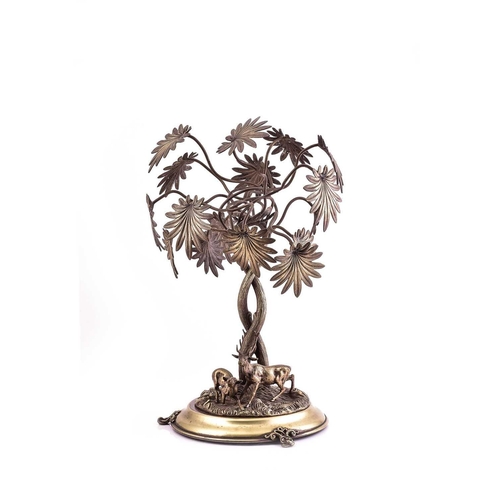 540 - A large silver plated table centrepiece, 19th century, modelled as a stag and doe before two large e... 