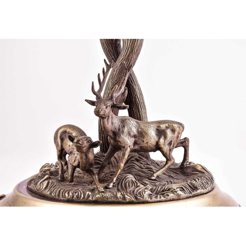 540 - A large silver plated table centrepiece, 19th century, modelled as a stag and doe before two large e... 