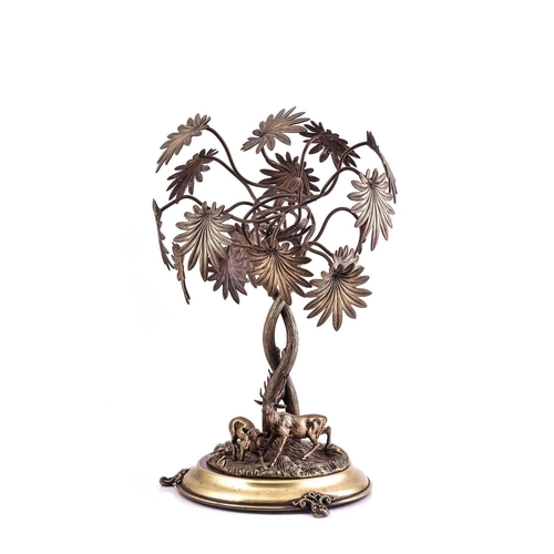 540 - A large silver plated table centrepiece, 19th century, modelled as a stag and doe before two large e... 