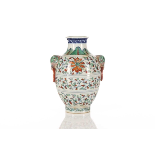 156 - A Chinese porcelain Doucai vase, possibly republic period, the shoulder painted with leaves above li... 