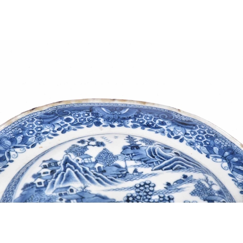 163 - Three Chinese export blue & white plates, Qing, 18th century, comprising a dished plate painted with... 