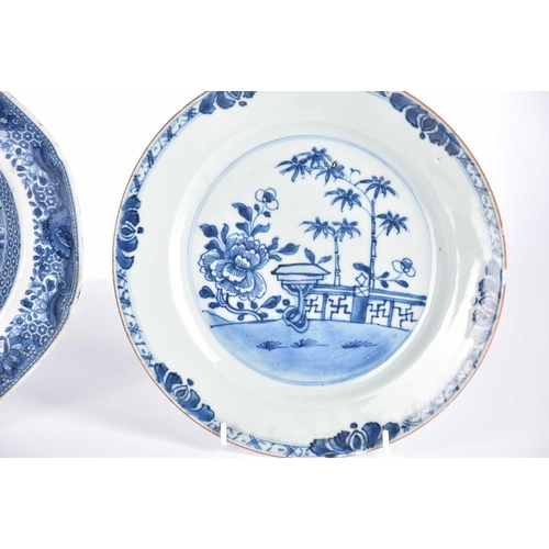 163 - Three Chinese export blue & white plates, Qing, 18th century, comprising a dished plate painted with... 