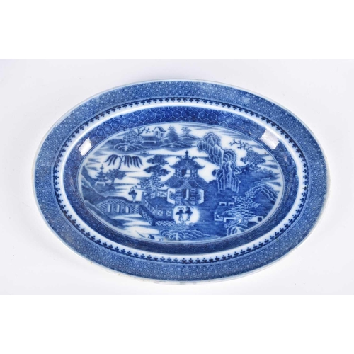 163 - Three Chinese export blue & white plates, Qing, 18th century, comprising a dished plate painted with... 