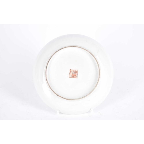 167 - A Chinese famille rose saucer dish, painted with the Tang general Guo Ziyi, with lines of calligraph... 