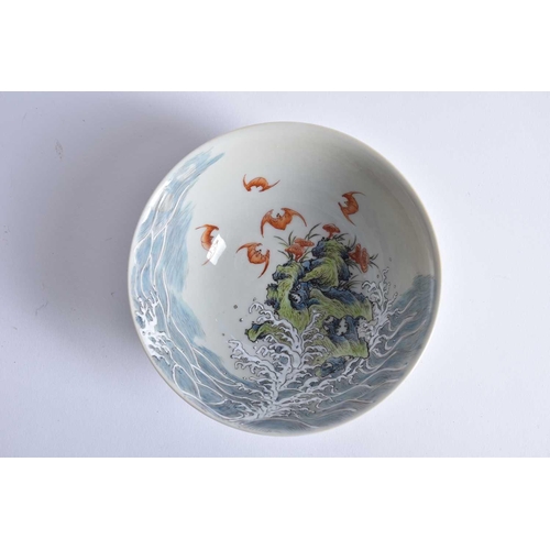 168 - A Chinese porcelain 'Wufu' bowl, finely decorated throughout with red bats flying above and around j... 