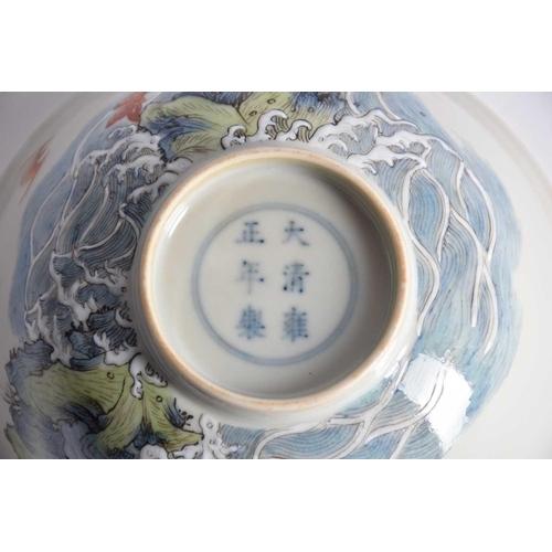 168 - A Chinese porcelain 'Wufu' bowl, finely decorated throughout with red bats flying above and around j... 