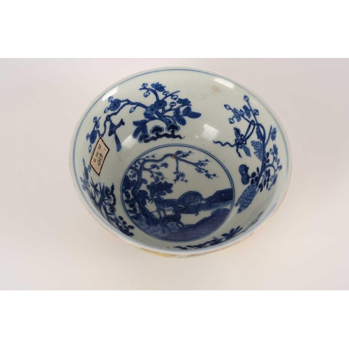 170 - A Chinese yellow ground bowl, 20th century, painted with medallions of goats by blossoming trees wit... 