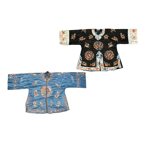 172 - Two Chinese embroidered silk summer jackets, 20th century, one decorated with gourds against a black... 