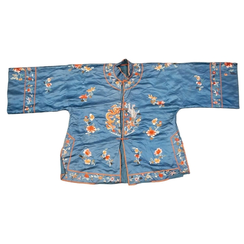 172 - Two Chinese embroidered silk summer jackets, 20th century, one decorated with gourds against a black... 