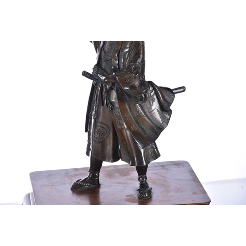 173 - Two Japanese bronze okimono of samurai, Meiji period, signed Akasofu Gyoko, cast as a signalman hold... 