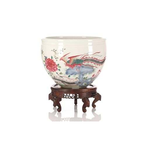 174 - A Chinese Yongzheng style famille rose jardiniere, painted with two Fenghuang, with rockwork, tree p... 