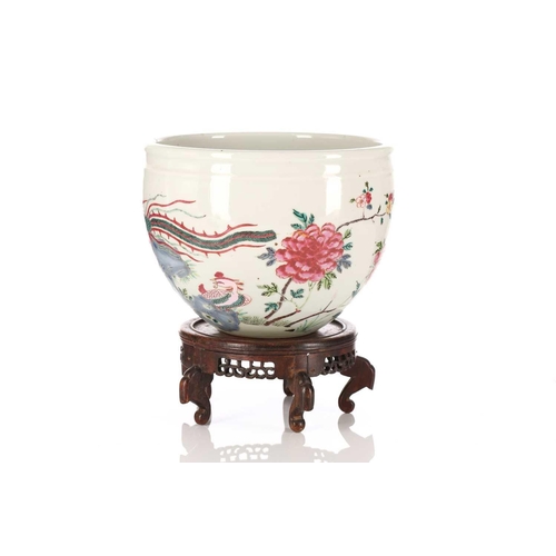 174 - A Chinese Yongzheng style famille rose jardiniere, painted with two Fenghuang, with rockwork, tree p... 