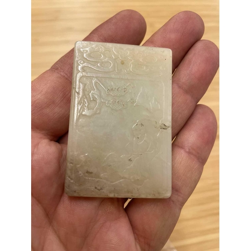 178 - Two Chinese jade pendants, one of rectangular form carved with a deity and dog beneath a pine tree a... 