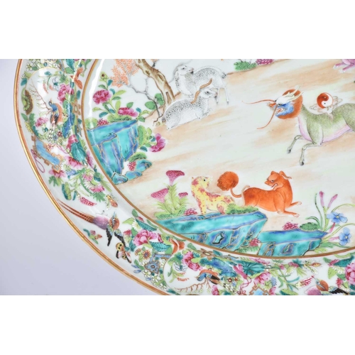 180 - A Chinese Famile Rose porcelain oval meat plate, Qing Dynasty, mid 19th century., painted with goat,... 