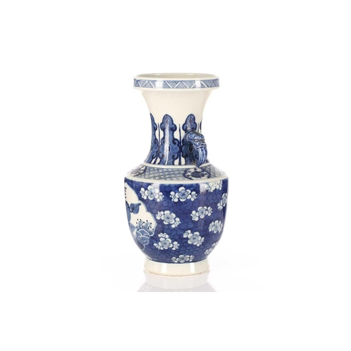 187 - A Chinese porcelain blue & white Kylin vase, the rim with straight sides above a waisted neck painte... 