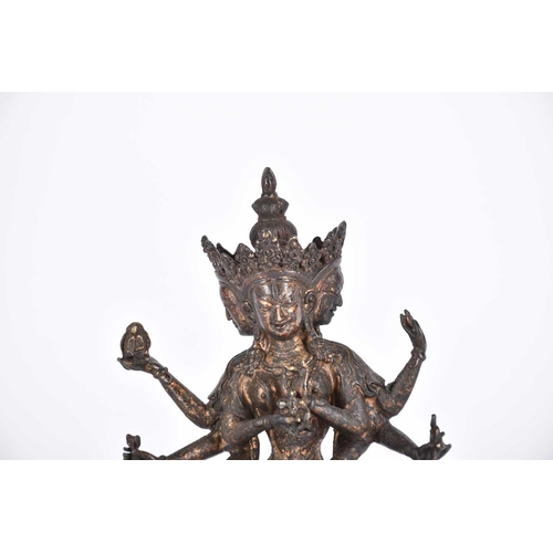 191 - A Chinese bronze figure of the Tibetan deity Usnisavijaya, seated o a double lotus base, traces of r... 