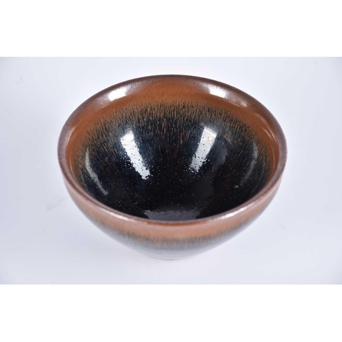 198 - A Chinese Jian ware style 'hares fur' bowl, of conical shape terminating in an unglazed foot, 12.5cm... 