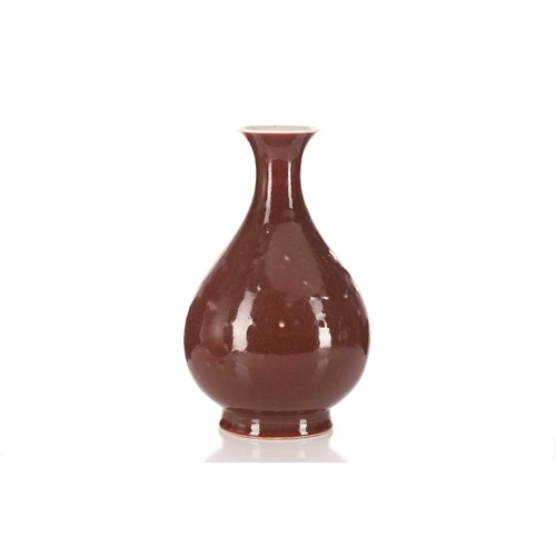 202 - A Chinese aubergine glazed porcelain yuhuchunping vase, a uniform colour throughout with raised and ... 