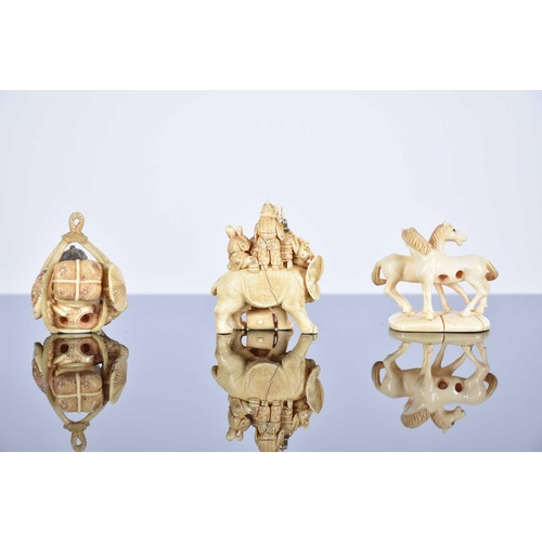 204 - Three Japanese ivory netsukes, Meiji period, comprising the seven gods of good fortune upon an eleph... 